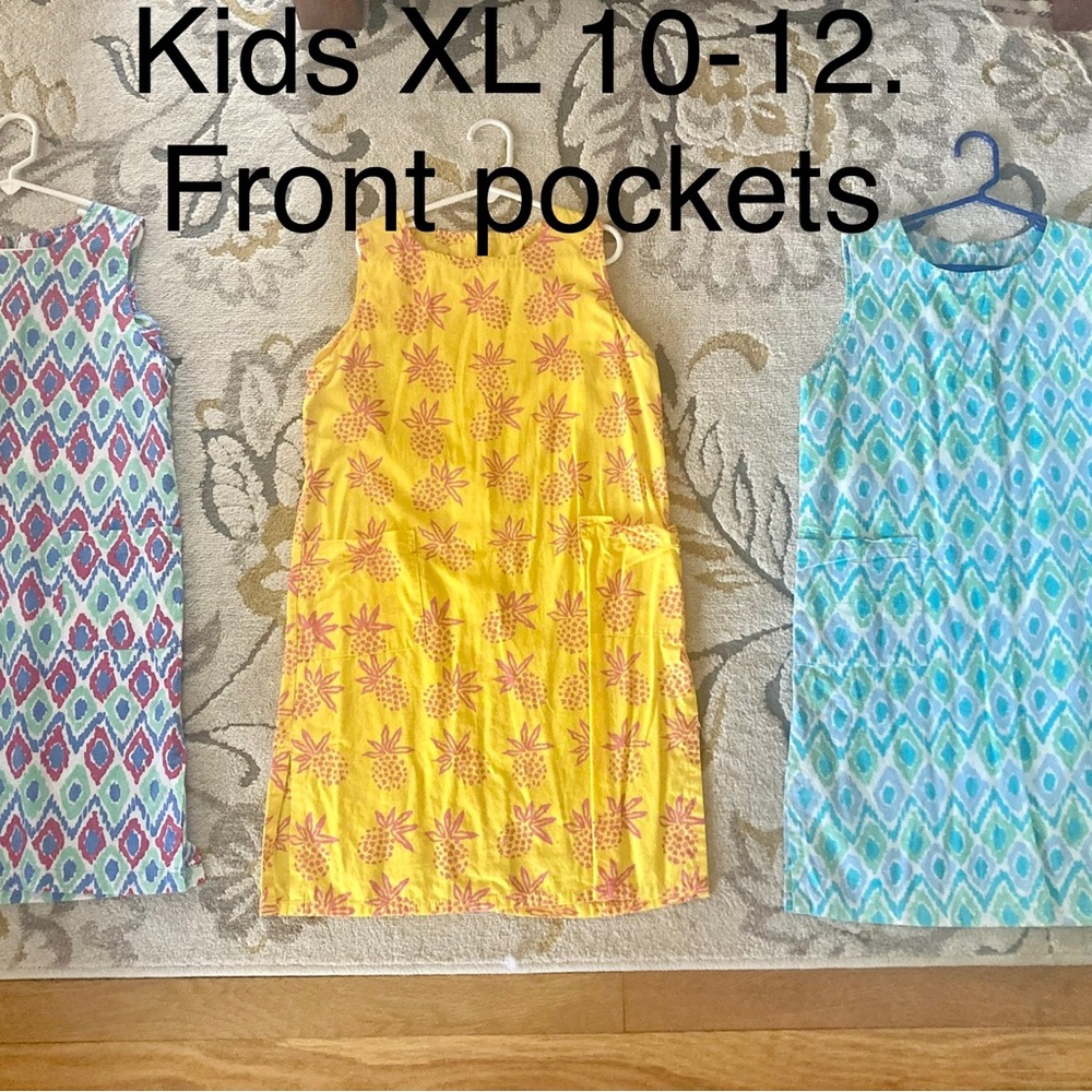 Colorful Three Islands shifts. Girls XL fits 10-12. Front pockets . $20 each